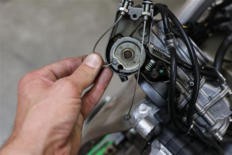 Place throttle cable in upper anchor pocket. . Suzuki outboard throttle cable adjustment